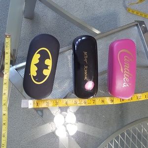 Designer clamshell eyeglass cases.